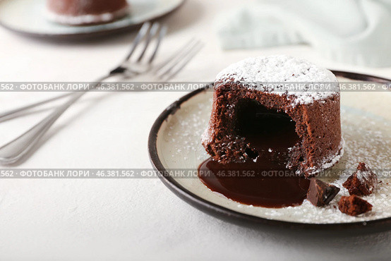 Plate with tasty lava cake fondant on white background, closeup. Стоковое фото, фотограф Pixel_shot / Фотобанк Лори