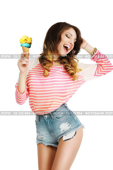 Pleasure. Cute Young Woman with Ice Cream Enjoying Life. Стоковое фото, фотограф Iryna Hramavataya / Smarterpix / Фотобанк Лори