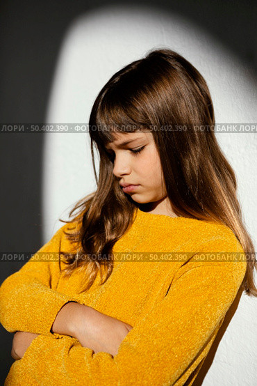 portrait beautiful little girl being bored. Стоковое фото, агентство Ingram Publishing / Фотобанк Лори