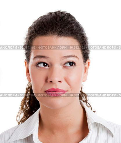 Portrait of a beautiful young woman thinking on something. Стоковое фото, агентство Ingram Publishing / Фотобанк Лори