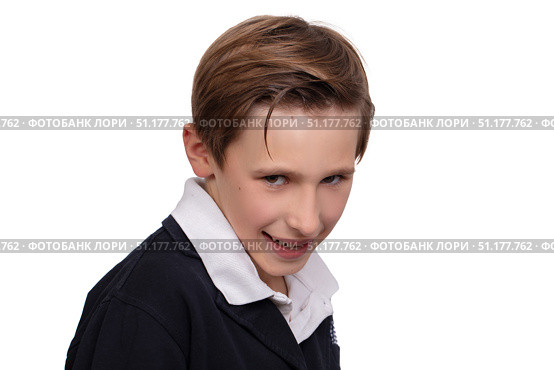 Portrait of a cheerful boy with a sly look on a white background close-up. Стоковое фото, фотограф Лазаренко Светлана / Фотобанк Лори