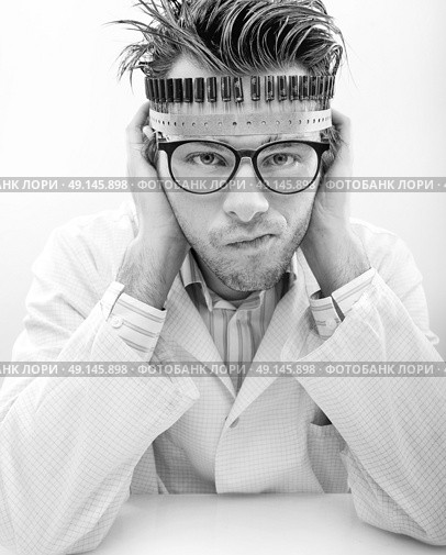 Portrait of a disappointed young technician. Стоковое фото, агентство Ingram Publishing / Фотобанк Лори