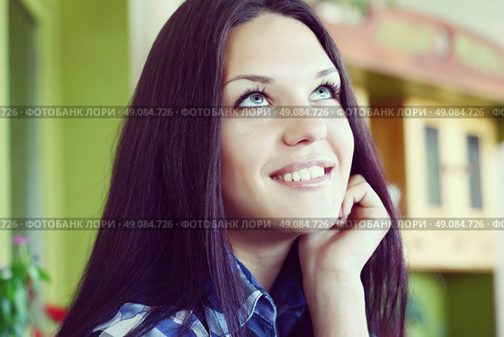 portrait of a young brunette woman with long beautiful hair close-up. Стоковое фото, агентство Ingram Publishing / Фотобанк Лори