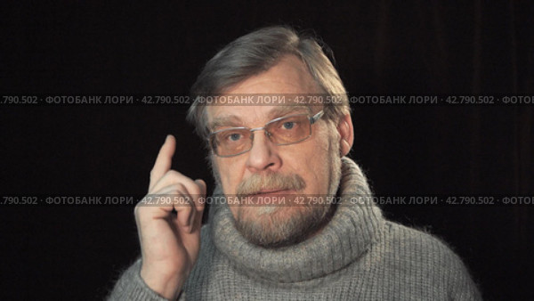 Portrait of an adult male. Emotions expressing thoughtfulness, thinking. Стоковое видео, видеограф EStarodubov / Фотобанк Лори