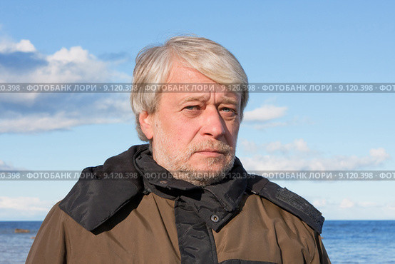 Portrait of middle-aged man at the sea. Стоковое фото, фотограф Roberts Ratuts / PantherMedia / Фотобанк Лори