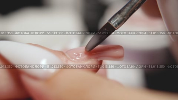 Precision Gel Polish Application for Nail Extensions. Стоковое видео, видеограф Скоробогатова Е. / Фотобанк Лори