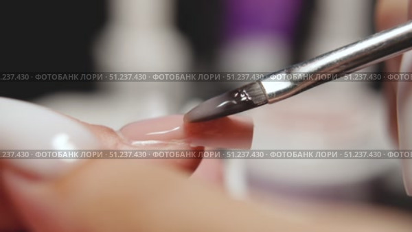 Precision Gel Polish Application for Nail Extensions. Стоковое видео, видеограф Скоробогатова Е. / Фотобанк Лори