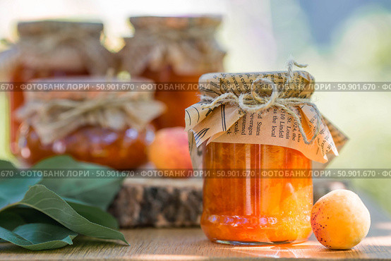 Preservation and summer harvest. Homemade healthy jelly, apricot jam. Preparing jars. Sweets and fruits. Стоковое фото, фотограф Photojuli / Фотобанк Лори