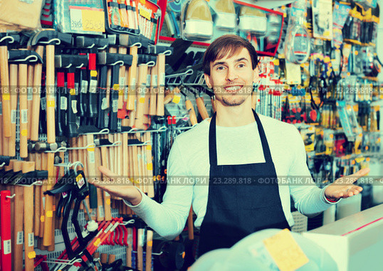 Professional friendly salesman working and smiling. Стоковое фото, фотограф Яков Филимонов / Фотобанк Лори