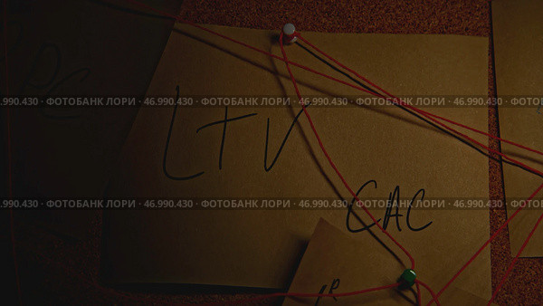 Quest with riddles on notes on blackboard in night room. Стоковое фото, фотограф David Kashakhi / Фотобанк Лори