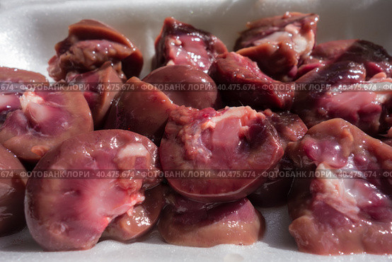 Raw chopped lamb kidneys before cooking. Стоковое фото, фотограф Iva Noel / Фотобанк Лори