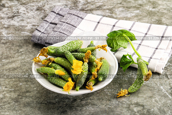 Raw gherkin cucumbers in the bowl. Стоковое фото, фотограф Андрей Старостин / Фотобанк Лори