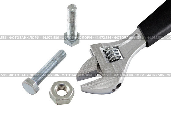 Разводной гаечный ключ на белом фоне. An adjustable wrench on a white background. Стоковое фото, фотограф Татьяна Д / Фотобанк Лори