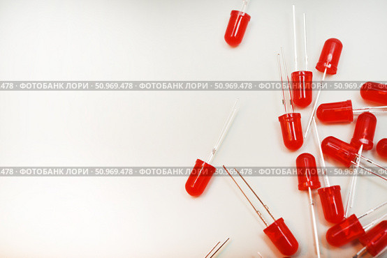 Red LED lamps. A scattering of electronic elements. Light-emitting diodes. Стоковое фото, фотограф Valeriy Lushchikov / Фотобанк Лори