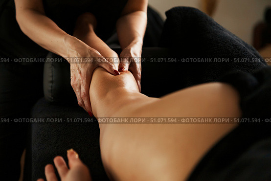 Relaxing Foot Massage Experience in a Tranquil Indoor Setting for Ultimate Comfort. Стоковое фото, фотограф Aleksandr Golubev / Фотобанк Лори