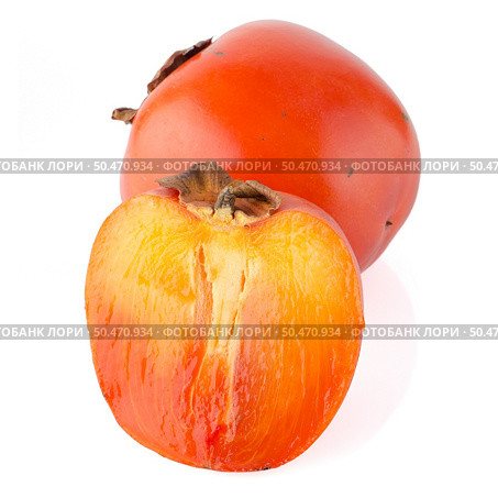 Ripe persimmons on white background. Стоковое фото, агентство Ingram Publishing / Фотобанк Лори