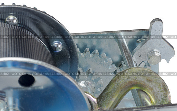 Ручная механическая лебедка на белом фоне. Boat trailer hand winch isolated on white background. Стоковое фото, фотограф Татьяна Д / Фотобанк Лори