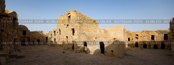 Ruins of Berber granary structures in Ksar Daghar in Tunisia. Стоковое фото, фотограф Яков Филимонов / Фотобанк Лори