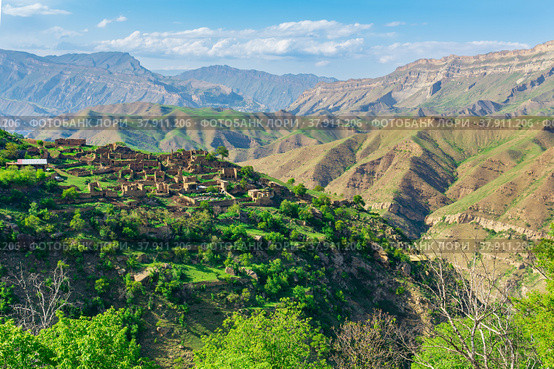 Ruins of houses on a mountainside in Kurib, a depopulated village with the only remaining household with an apiary, Dagestan. Стоковое фото, фотограф Евгений Харитонов / Фотобанк Лори