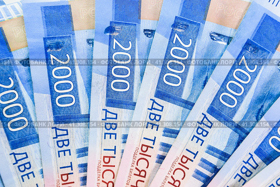Russian money banknotes in nominal value of two thousand. New tickets of the bank of Russia. Russian money. Стоковое фото, фотограф Леонид Еремейчук / Фотобанк Лори