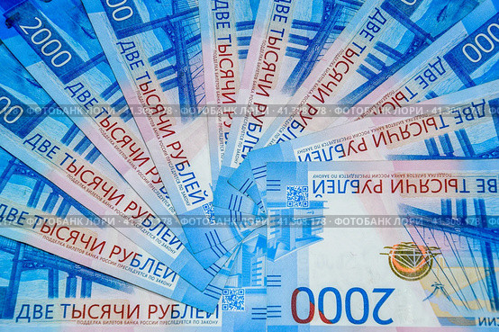 Russian money banknotes in nominal value of two thousand. New tickets of the bank of Russia. Russian money. Стоковое фото, фотограф Леонид Еремейчук / Фотобанк Лори