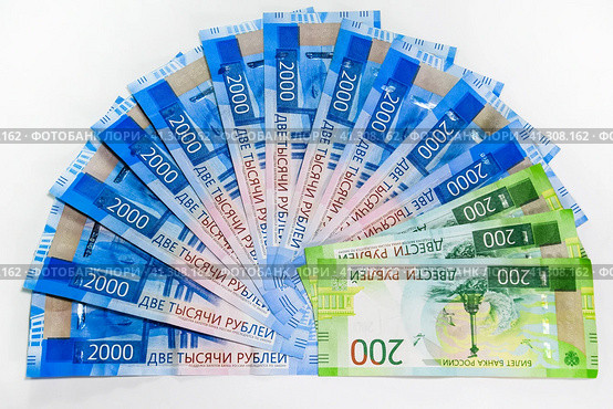 Russian new denominations of 2000 and 200 rubles. Russian banknotes. Russian money is ruble. Стоковое фото, фотограф Леонид Еремейчук / Фотобанк Лори
