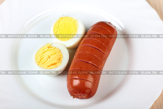 Sausage and fried eggs. Стоковое фото, фотограф Николай Григорьев / Фотобанк Лори