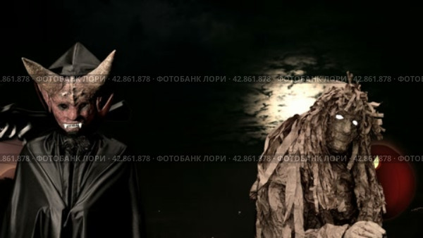 Scary creatures at night with a full glowing moon. Lightning flashes in the sky. Halloween concept. Devil, forest goblin, clown, pumpkin and witches. Animation. Стоковая анимация, аниматор Дмитрий Кобзев / Фотобанк Лори