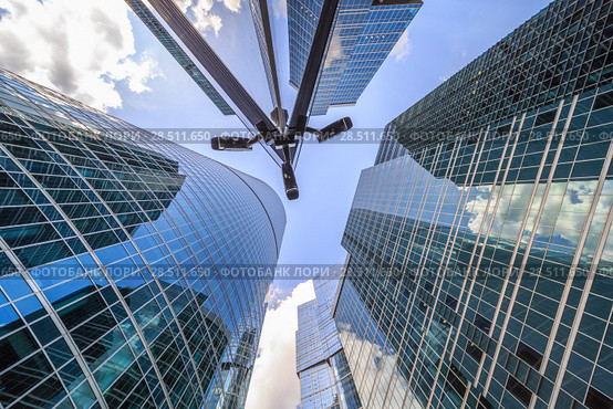 Security cameras installed on Skyscraper. Стоковое фото, фотограф Виталий Поздеев / Фотобанк Лори