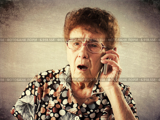 Seniors talking mobile phone. Стоковое фото, фотограф Гладских Татьяна / Фотобанк Лори