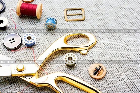 Set of buttons, threads and other sewing accessories.Tools for sewing. Set sewing accessories. Стоковое фото, агентство Ingram Publishing / Фотобанк Лори