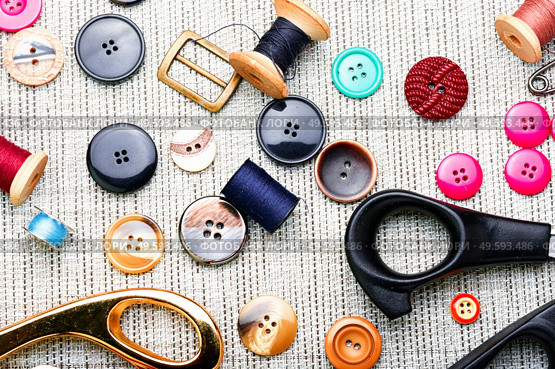 Set of buttons, threads and other sewing accessories.Tools for sewing. Set sewing accessories. Стоковое фото, агентство Ingram Publishing / Фотобанк Лори