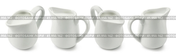 Set of ceramic milk jars or creamers isolated on white background. Стоковое фото, фотограф Катерина Ковалева / Фотобанк Лори