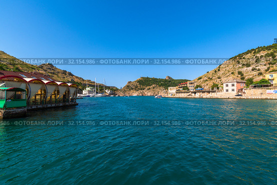 Sevastopol, Crimea - July 3. 2019. General view of Balaklava Bay from top in summer. Редакционное фото, фотограф Володина Ольга / Фотобанк Лори
