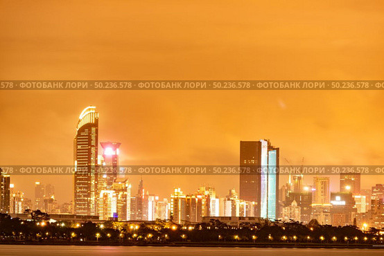Shenzhen, Shenzhen Bay Park sunset scenery, skyline building city. Стоковое фото, агентство Ingram Publishing / Фотобанк Лори