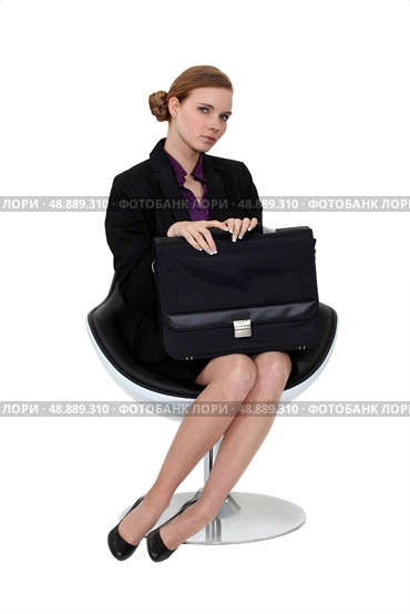 Shy applicant waiting in an armchair. Стоковое фото, агентство Ingram Publishing / Фотобанк Лори