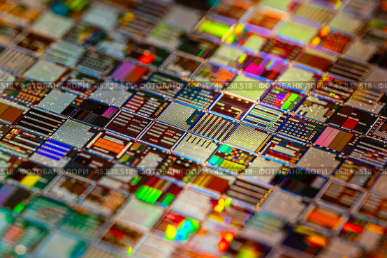 Silicon semiconductor wafer close-up. In electronics, a wafer also called a slice or substrate is a thin slice of semiconductor, a crystalline silicon, used for the fabrication of integrated circuits. Стоковое фото, фотограф Андрей Армягов / Фотобанк Лори