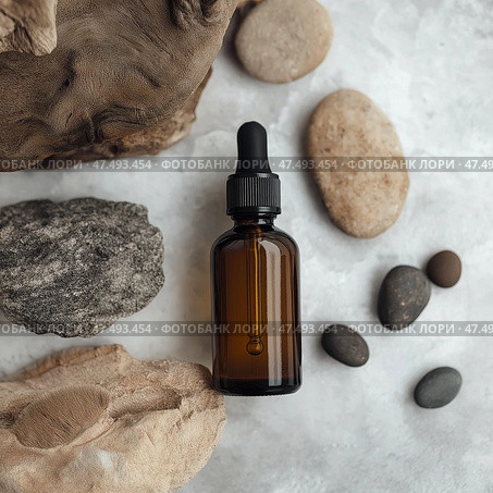 Skincare bottle mockup resting amidst calming natural stones on a smooth surface. Skincare bottle resting amidst calming natural stones on a smooth surface. Стоковое AI-изображение, AI-художник Katsiaryna Repich / Фотобанк Лори