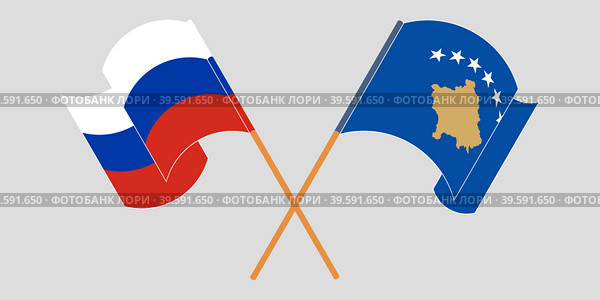 Скрещенные и развевающиеся флаги России и Косово. Стоковая иллюстрация, иллюстратор Олег Безруков / Фотобанк Лори