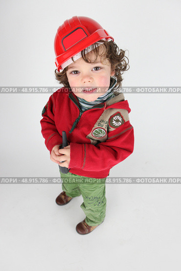 Small boy pretending to be foreman. Стоковое фото, агентство Ingram Publishing / Фотобанк Лори