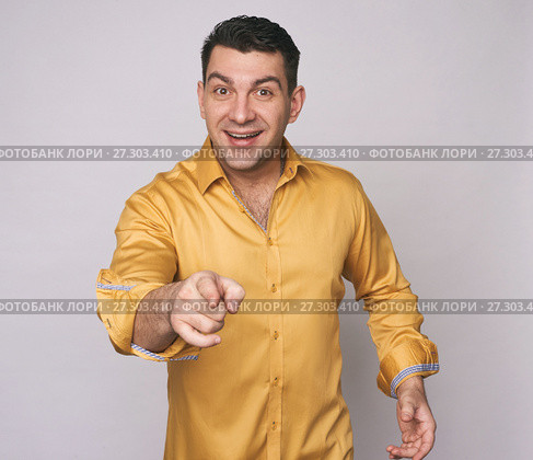 smiling man pointing at you. Стоковое фото, фотограф Александр Лычагин / Фотобанк Лори
