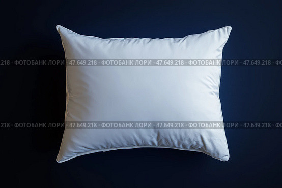 Soft white pillow resting on a dark blue background for stylish decor. Мягкая белая подушка на темно-синем фоне для стильного декора. Стоковое AI-изображение, AI-художник Katsiaryna Repich / Фотобанк Лори