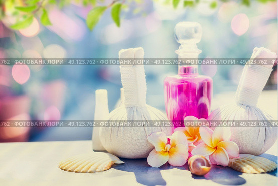 Spa and massage setting with  frangipany flowers for Healthy  treatments at spring or summer nature background. Стоковое фото, агентство Ingram Publishing / Фотобанк Лори