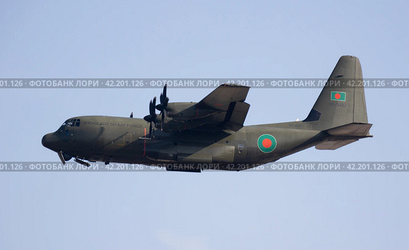 SPAIN, BARCELONA - AUGUST 8, 2023: Lockheed Martin C-130J Super Hercules of Bangladesh taking off from Barcelona. Редакционное фото, фотограф Яков Филимонов / Фотобанк Лори