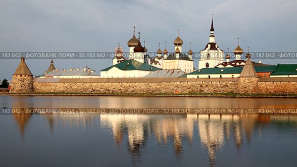 Spaso-Preobrazhensky the Solovetsky Stavropegial monastery on Bolshoy Solovetsky island in the White sea. Arkhangelsk region. View from the Holy lake. Russia. Стоковое видео, видеограф Наталья Волкова / Фотобанк Лори