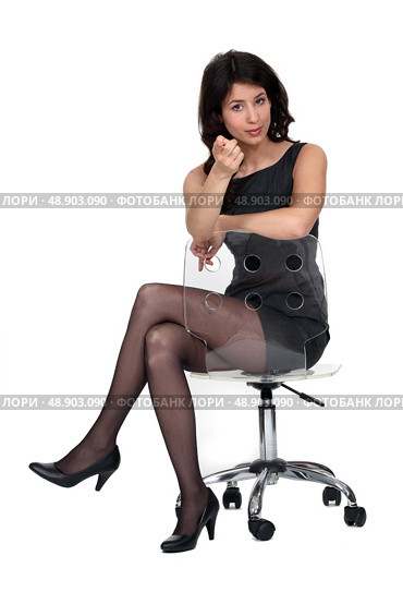 splendid brunette sat on chair. Стоковое фото, агентство Ingram Publishing / Фотобанк Лори