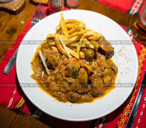 Stewed pork meat with potatoes and gravy. Traditional Bulgarian dish. Стоковое фото, фотограф Яков Филимонов / Фотобанк Лори