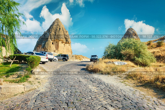 Stone road in Cappadocia at sunset. City of Goreme. Стоковое фото, агентство Ingram Publishing / Фотобанк Лори