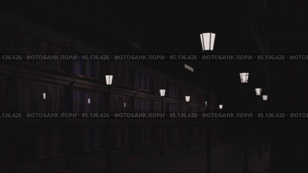 Streetlights turning on one by one illuminating empty city street. Стоковое видео, видеограф Данил Руденко / Фотобанк Лори