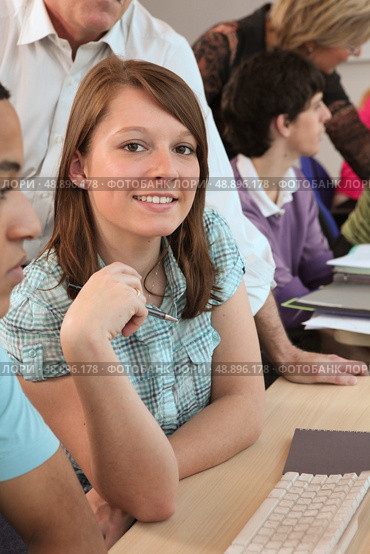 Students using computers in class. Стоковое фото, агентство Ingram Publishing / Фотобанк Лори
